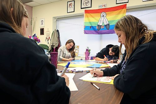 14112024
(L-R) Jamie Brown, Megan Prince, Jennifer Bernhardt and Nicole Funk with the Women&#x2019;s Resource Centre create signs and placards on Thursday afternoon for marchers to carry during Thursday evening&#x2019;s Take Back The Night march. November marks Domestic Violence Awareness Month and the annual march brings attention to gender-based and sexual violence. (Tim Smith/The Brandon Sun)