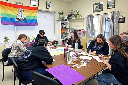 14112024
(L-R) Megan Prince, Lucia Aguilar, Jennifer Bernhardt, Kelsey Crandall, Nicole Funk and Jamie Brown with the Women&#x2019;s Resource Centre create signs and placards on Thursday afternoon for marchers to carry during Thursday evening&#x2019;s Take Back The Night march. November marks Domestic Violence Awareness Month and the annual march brings attention to gender-based and sexual violence. (Tim Smith/The Brandon Sun)