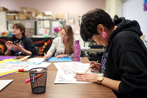 14112024
Jennifer Bernhardt with the Women&#x2019;s Resource Centre creates signs and placards with coworkers on Thursday afternoon for marchers to carry during Thursday evening&#x2019;s Take Back The Night march. November marks Domestic Violence Awareness Month and the annual march brings attention to gender-based and sexual violence. (Tim Smith/The Brandon Sun)