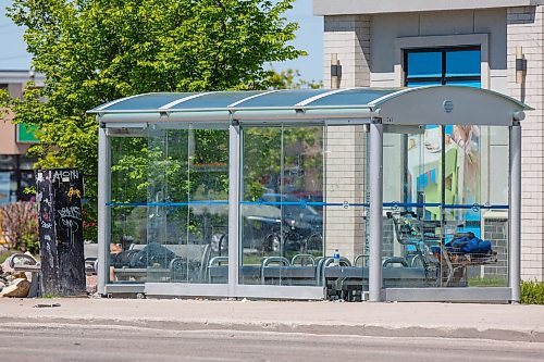 MIKE DEAL / WINNIPEG FREE PRESS
A houseless person lays down on the bench by the bus shelter at the corner of Regent Avenue West and Stapon Road.
During Thursday's council meeting, Transcona Councillor Shawn Nason will ask the Public Service to dismantle a pair of problem bus shelters located near Kildonan Place Mall. 
See Tyler Searle story
220607 - Tuesday, June 07, 2022.