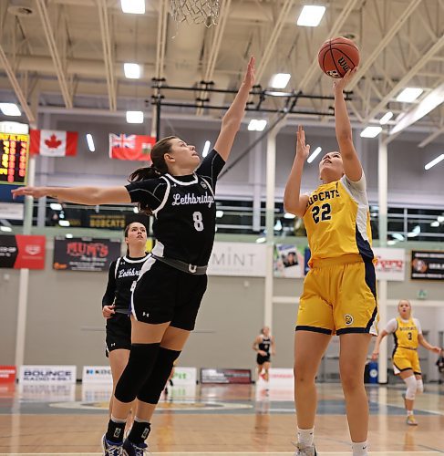 Jayna Maytwayashing of the Brandon University Bobcats leaps to take a shot on net during university women’s basketball action against the University of Lethbridge Pronghorns at the BU Healthy Living Centre on Friday evening. 
(Tim Smith/The Brandon Sun)