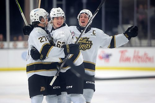 Luke Shipley (27), Nicholas Johnson (62) and Quinn Mantei (8) of the Brandon Wheat Kings celebrate a goal by Johnson during WHL action against the Regina Pats at Westoba Place on Friday evening. 
(Tim Smith/The Brandon Sun)