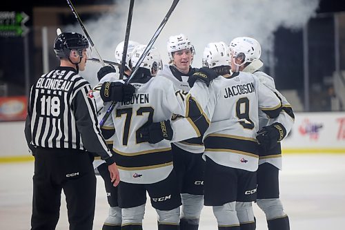 Teammates crowd rush Nicholas Johnson #62 (C) of the Brandon Wheat Kings to celebrate his goal during WHL action against the Regina Pats at Westoba Place on Friday evening. 
(Tim Smith/The Brandon Sun)