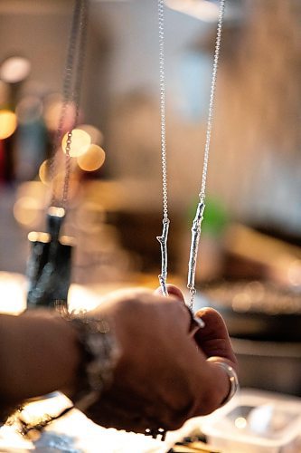 MIKAELA MACKENZIE / FREE PRESS
	
Karen Schmidt Humiski and her handmade jewelry in Winnipeg on Thursday, Nov. 14, 2024. She has been working with silver for 43 years, 30 of which were spent teaching jewelry and metal smithing.

For AV story
Winnipeg Free Press 2024