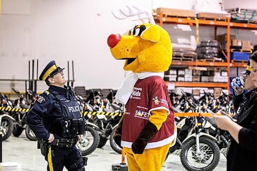 MIKAELA MACKENZIE / FREE PRESS
	
Manitoba RCMP staff sergeant Shelley Lepla and mascot Rudy at the launch of Operation Red Nose in Winnipeg on Friday, Nov. 15, 2024. Operation Red Nose runs from Nov 29th until New Year&#x573; Eve.

Standup.
Winnipeg Free Press 2024