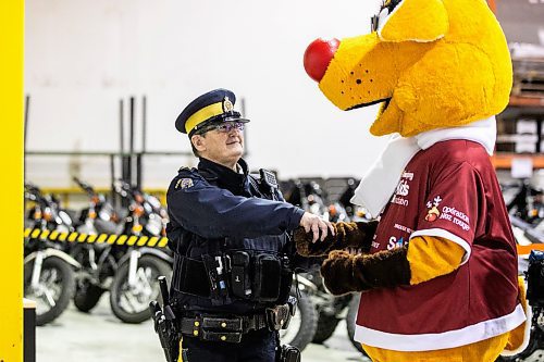 MIKAELA MACKENZIE / FREE PRESS
	
Manitoba RCMP staff sergeant Shelley Lepla and mascot Rudy at the launch of Operation Red Nose in Winnipeg on Friday, Nov. 15, 2024. Operation Red Nose runs from Nov 29th until New Year&#x573; Eve.

Standup.
Winnipeg Free Press 2024