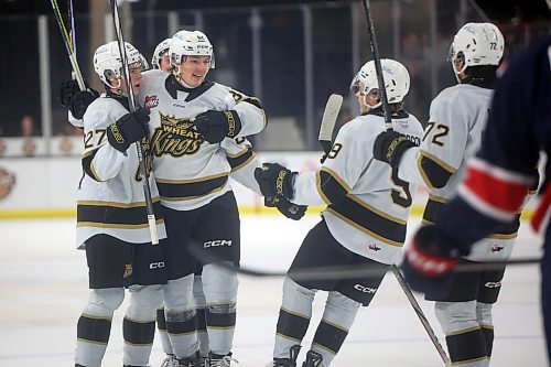 15112024
Teammates crowd rush Nicholas Johnson #62 of the Brandon Wheat Kings to celebrate his goal during WHL action against the Regina Pats at Westoba Place on Friday evening. 
(Tim Smith/The Brandon Sun)