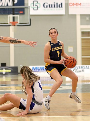 Brandon University rookie Taya Clark gets Lethbridge Pronghorns Courtney McKee to fall in Canada West women's basketball action at the Healthy Living Centre on Saturday. (Thomas Friesen/The Brandon Sun)