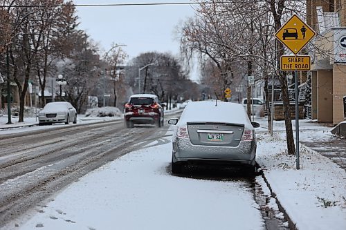 Brandon's first snowfall on Leorne Ave. on Sunday morning after the Saturday fall. Environment Canada senior meteorologist Dan Fulton said Brandonites should expect a stark contrast to the current mild conditions, “We are looking at a fairly significant storm that’s going to affect the region. For Tuesday, you can expect probably early morning hours some rain or possibly some freezing rain, depending on the temperature. But that will probably change to snow on Tuesday, and then we’re looking at fairly significant snow." (Abiola odutola/The Brandon Sun)