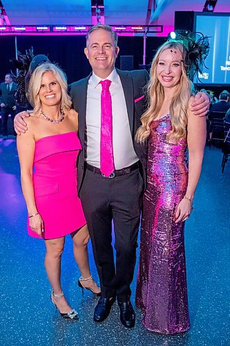 BROOK JONES/FREE PRESS
Matthew Kroeker (middle) is pictured with his wife Colleen Kroeker (left) and their friend Kirsten McConnell (right) as they attend the Royal Manitoba Theatre Centre Black &amp; White Ball inside Alloway Hall at the Manitoba Museum in Winnipeg, Man., Saturday, Nov. 16, 2024. The Black &amp; White Ball is an annual fundraiser for the Royal MTC. The black tie formal event encouraged attendees to dress in colour and also featured the Big City All Star Band as well as a live auction, silent auction and an art auction.