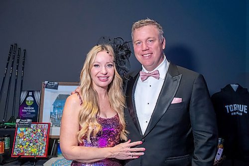 BROOK JONES/FREE PRESS
Kirsten McConnell (left) and her husband Dan McConnell attend the Royal Manitoba Theatre Centre Black &amp; White Ball inside Alloway Hall at the Manitoba Museum in Winnipeg, Man., Saturday, Nov. 16, 2024. The Black &amp; White Ball is an annual fundraiser for the Royal MTC. The black tie formal event encouraged attendees to dress in colour and also featured the Big City All Star Band as well as a live auction, silent auction and an art auction.