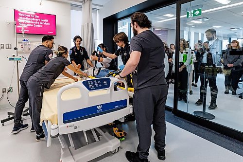 MIKE DEAL / FREE PRESS
Nursing And Paramedicine program students conduct a simulation for the attendees of the grand opening Monday afternoon.
Red River College Polytechnic (RRC Polytech) officially opened its new Interdisciplinary Health and Community Services Simulation Centre (the Simulation Centre) during a ceremony at the Notre Dame Campus Monday afternoon.
241118 - Monday, November 18, 2024.