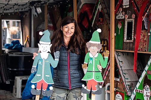 MIKAELA MACKENZIE / FREE PRESS
	
Jen de Delley takes her Christmas elf village out of storage in her carport workshop in River Heights on Monday, Nov. 18, 2024.

For AV story.
Winnipeg Free Press 2024