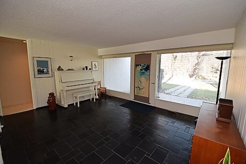 Todd Lewys / Free Press
Entrance to the home comes via a wide, welcoming foyer with charcoal slate floor &#x2014; and lovely view of the trees that front the home.