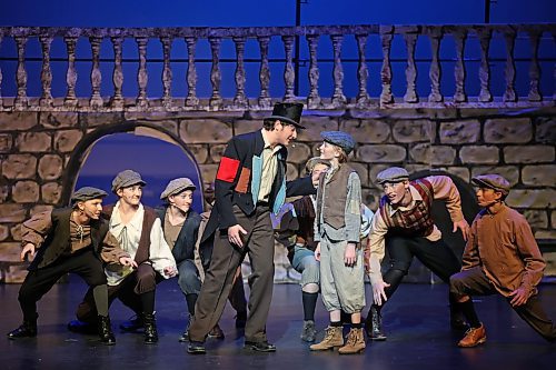 Cast members run through the dress rehearsal for Mecca Productions presentation of "Oliver!" at the Western Manitoba Centennial Auditorium on Wednesday evening. The musical, which features a live orchestra, opens tonight and runs until Saturday. (Tim Smith/The Brandon Sun)