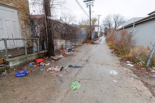 MIKE DEAL / FREE PRESS
Garbage litters the back alley between Selkirk and Pritchard Avenues near Main Street.
A North End resident fed up by garbage being dumped in her back alley says she doesn&#x2019;t know what to do anymore; her last complaint (of several) ended with the city saying it would look into it by April of next year. &#x201c;Seriously! I pay taxes and this is the best response I can get,&#x201d; said Carla Davidson, who lives on Selkirk Avenue. &#x201c;People regularly drive down and dump their garbage... I guarantee you if this was happening in a more upscale neighbourhood, this would be dealt with immediately.&#x201d; 
Reporter: Joyanne Pursaga
241120 - Wednesday, November 20, 2024.