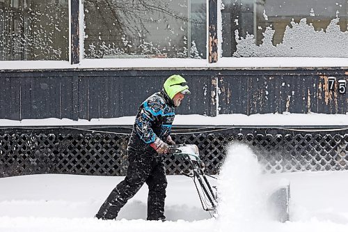 20112024
Snow clings to Trysten Jefferies&#x2019; beard as he uses a snowblower to clear snow from in front of his home in Souris during flurries on Wednesday afternoon. An overnight winter storm blanketed Westman in snow.  (Tim Smith/The Brandon Sun)