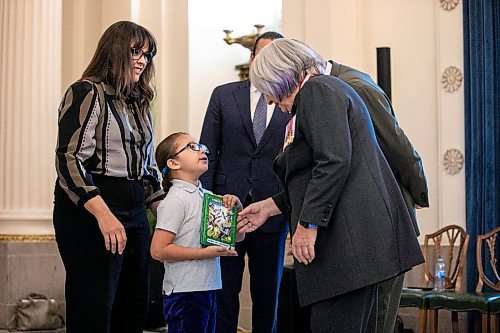 MIKAELA MACKENZIE / FREE PRESS
	
Tobasonakwut Kinew presents speaking note suggestions to governor general Mary Simon before the presentation of the King Charles III Coronation medal to his dad, premier Wab Kinew, on Wednesday, Nov. 20, 2024.


Winnipeg Free Press 2024