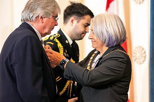 MIKAELA MACKENZIE / FREE PRESS
	
Governor general Mary Simon invests Bernard Joseph into the Order of Canada for his writing on Manitoba&#x573; francophone community at the legislative building on Wednesday, Nov. 20, 2024.


Winnipeg Free Press 2024