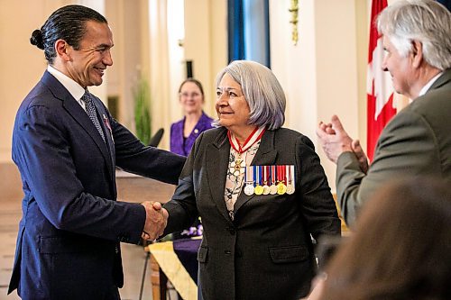 MIKAELA MACKENZIE / FREE PRESS
	
Governor general Mary Simon presents premier Wab Kinew with the the King Charles III Coronation medal at the legislative building on Wednesday, Nov. 20, 2024.


Winnipeg Free Press 2024