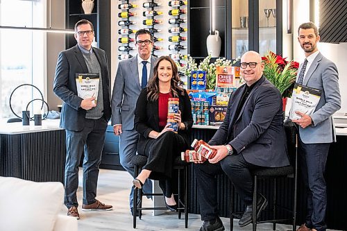 MIKAELA MACKENZIE / FREE PRESS
	
Moore Group realtors David Van Benthem (left), Reid Boles, Stephanie Baron, Scott Moore, and Phil Gear in one of their show homes on Wednesday, Nov. 20, 2024. The group is gearing up for its eighth annual food drive in support of William Whyte School, a Kindergarten to Grade 8 school in the North End.

For Aaron story.
Winnipeg Free Press 2024