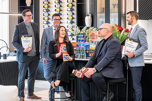 MIKAELA MACKENZIE / FREE PRESS
	
Moore Group realtors David Van Benthem (left), Reid Boles, Stephanie Baron, Scott Moore, and Phil Gear in one of their show homes on Wednesday, Nov. 20, 2024. The group is gearing up for its eighth annual food drive in support of William Whyte School, a Kindergarten to Grade 8 school in the North End.

For Aaron story.
Winnipeg Free Press 2024