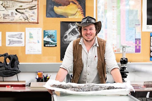 MIKAELA MACKENZIE / FREE PRESS
	
Paleontologist and animal ecologist Maximilian Scott with a Tylosaurus (type of Mosasaur) jaw in the U of M paleontology lab on Wednesday, Nov. 20, 2024. Scott is currently conducting research into the Mosasaurus, an enormous aquatic lizard that lived during the late cretaceous period.

For AV story.
Winnipeg Free Press 2024