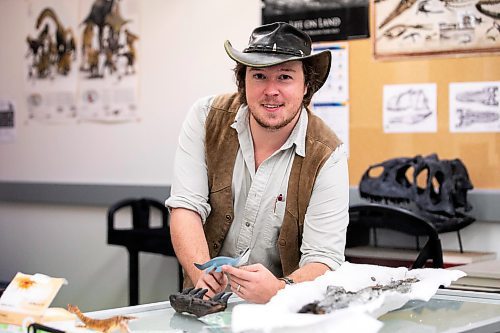 MIKAELA MACKENZIE / FREE PRESS
	
Paleontologist and animal ecologist Maximilian Scott with a Mosasaurus model in the U of M paleontology lab on Wednesday, Nov. 20, 2024. Scott is currently conducting research into the Mosasaurus, an enormous aquatic lizard that lived during the late cretaceous period.

For AV story.
Winnipeg Free Press 2024