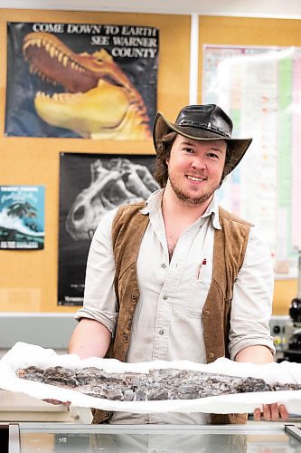 MIKAELA MACKENZIE / FREE PRESS
	
Paleontologist and animal ecologist Maximilian Scott with a Tylosaurus (type of Mosasaur) jaw in the U of M paleontology lab on Wednesday, Nov. 20, 2024. Scott is currently conducting research into the Mosasaurus, an enormous aquatic lizard that lived during the late cretaceous period.

For AV story.
Winnipeg Free Press 2024