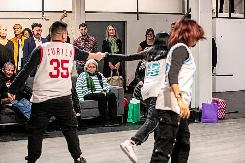 MIKAELA MACKENZIE / FREE PRESS
	
Breakdancers JR Manaligod (left), Mickey Thai, and Mandeep Saini perform for governor general Mary Simon at the Graffiti Gallery on Thursday, Nov. 21, 2024. The performance followed a roundable discussion with the governor general at the gallery as part of her Mental Health Learning and Listening Tour. 

Standup.
Winnipeg Free Press 2024