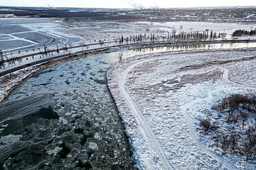 21112024
Ice begins to form on the Assiniboine River next to First Street North in Brandon on Thursday.  (Tim Smith/The Brandon Sun)