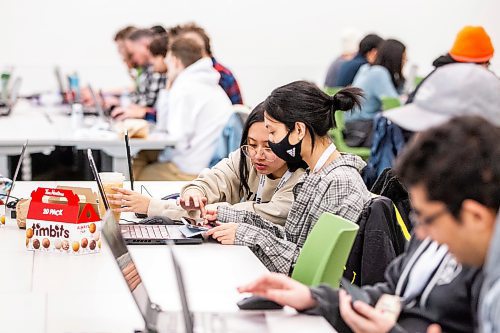 MIKAELA MACKENZIE / WINNIPEG FREE PRESS

Digital media design student Joyce Dijamco (left) and her sister Jana Dijamco at Game Jam in Winnipeg on Friday, Feb. 24, 2023. Game Jam brings students and industry professionals together to create video games. For Gabby story.

Winnipeg Free Press 2023.