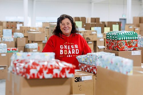 MIKE DEAL / FREE PRESS
Shawna Bell, Executive Director, The Christmas Cheer Board of Winnipeg, in the warehouse where presents are being wrapped and food hampers are being boxed up in preparation for the holiday season.
241122 - Friday, November 22, 2024.