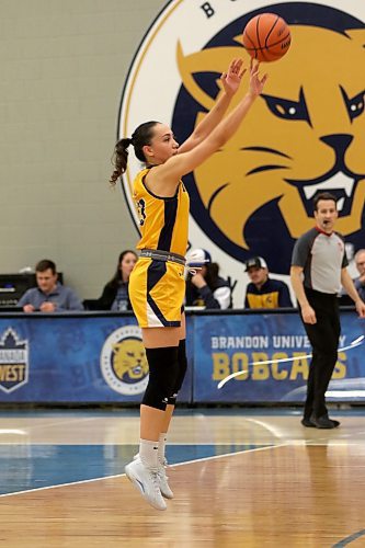 Faith Clearsky shoots a long three-pointer as the Brandon University Bobcats play the Alberta Pandas in Canada West women's basketball at the Healthy Living Centre on Friday. (Thomas Friesen/The Brandon Sun)