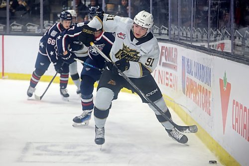 22112024
Nolan Flamand #91 of the Brandon Wheat Kings plays the puck behind the Tri-City Americans net during WHL action at Westoba Place on Friday evening. 
(Tim Smith/The Brandon Sun)