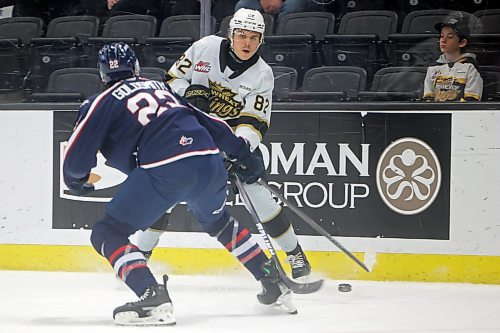 22112024
Dominik Petr #82 of the Brandon Wheat Kings looks to slip the puck past Terrell Goldsmith #22 of the Tri-City Americans during WHL action at Westoba Place on Friday evening. 
(Tim Smith/The Brandon Sun)