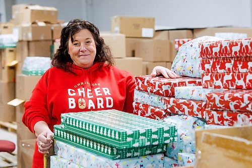 MIKE DEAL / FREE PRESS
Shawna Bell, Executive Director, The Christmas Cheer Board of Winnipeg, in the warehouse where presents are being wrapped and food hampers are being boxed up in preparation for the holiday season.
241122 - Friday, November 22, 2024.