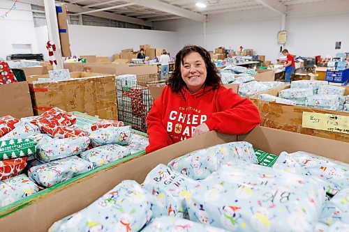 MIKE DEAL / FREE PRESS
Shawna Bell, Executive Director, The Christmas Cheer Board of Winnipeg, in the warehouse where presents are being wrapped and food hampers are being boxed up in preparation for the holiday season.
241122 - Friday, November 22, 2024.