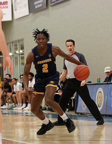 Brandon University Bobcats rookie Youri Cange (2) held Alberta's Isaac Simon to 11 points in a 78-59 BU victory at the Healthy Living Centre on Saturday, improving to 2-6 on the Canada West men's basketball season. (Thomas Friesen/The Brandon Sun)