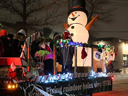 One of the 60 floats that took part in the 2024 Brandon Santa Parade Saturday evening with the route going down Rosser and then Princess Avenues. (Michele McDougall/The Brandon Sun) 
