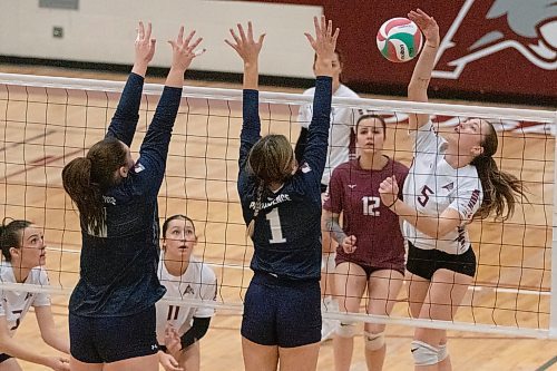 Jordyn Paddock hits against the Providence Pilots block on Saturday afternoon. The Cougars dropped both of the weekend matches to the undefeated Pilots. (Matt Packwood/The Brandon Sun)