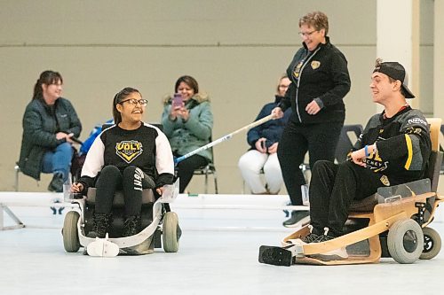 Westman Volt hockey participants share a smile in a break in action at the Keystone City Centre Sqaure arena. (Matt Packwood/The Brandon Sun)