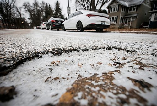 JOHN WOODS / FREE PRESS
A pothole on Ash Street Sunday, November 24, 2024. 

Reporter: scott