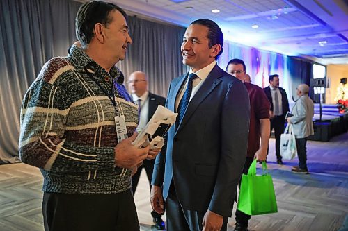 RUTH BONNEVILLE / FREE PRESS

LOCAL -  AMM Kinew 

Premier Wab Kinew chats with Grant Jardine, Councillor with the RM of North Cypress-Langford, after giving his  Premier&#x573; address at the Association of Manitoba Municipalities (AMM) fall convention at RBC Convention Centre Monday. 


Nov  25th, 2024