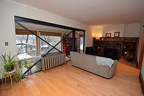 Todd Lewys / Free Press
A wood-burning fireplace with oak entertainment unit serves as the focal point of the home&#x2019;s lovely living room.