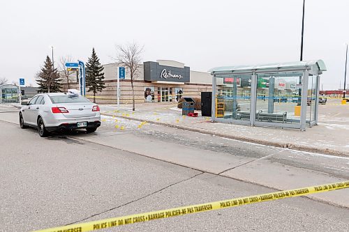 MIKE DEAL / FREE PRESS
Winnipeg Police are still at the scene Monday morning at the bus stop in the parking lot of a Walmart (3655 Portage Avenue) where an officer involved shooting occurred happened Sunday evening.
Winnipeg police shot and killed a male outside a bus shelter at a west Winnipeg shopping area Sunday after they say he stabbed an officer in the throat.
241125 - Monday, November 25, 2024.