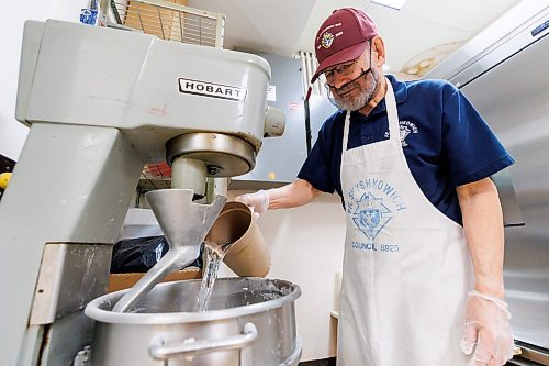 MIKE DEAL / FREE PRESS
Dennis Wawrykow adds the ingredients to the large mixer at the dough mixing station.
St. Joseph's Ukrainian Catholic Church (250 Jefferson Ave) perogie &quot;bee,&quot; which has been going on for years, ahead of the holidays.
A group of volunteers who've been making perogies for eons, in the basement of the church, pinching perogies that will go on sale the following week.
Reporter: David Sanderson
241120 - Wednesday, November 20, 2024.