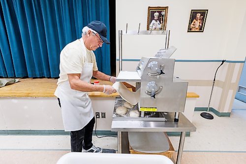 MIKE DEAL / FREE PRESS
Ron Lukie at the dough rolling station flattens the dough balls out for the cutters.
St. Joseph's Ukrainian Catholic Church (250 Jefferson Ave) perogie &quot;bee,&quot; which has been going on for years, ahead of the holidays.
A group of volunteers who've been making perogies for eons, in the basement of the church, pinching perogies that will go on sale the following week.
Reporter: David Sanderson
241120 - Wednesday, November 20, 2024.