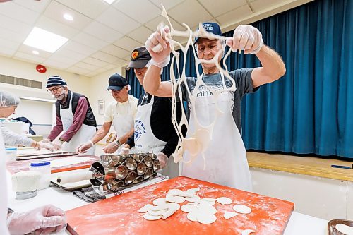 MIKE DEAL / FREE PRESS
Gary Lukie shakes the cut pieces of dough loose.
St. Joseph's Ukrainian Catholic Church (250 Jefferson Ave) perogie &quot;bee,&quot; which has been going on for years, ahead of the holidays.
A group of volunteers who've been making perogies for eons, in the basement of the church, pinching perogies that will go on sale the following week.
Reporter: David Sanderson
241120 - Wednesday, November 20, 2024.