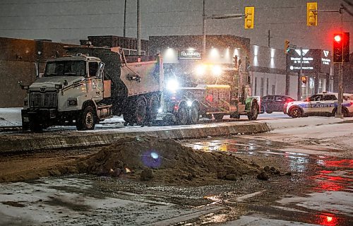 JOHN WOODS / FREE PRESS
A city sanding truck is towed away after it tipped over on Sargent Ave at St James  Monday, November 25, 2024.

Reporter: standup